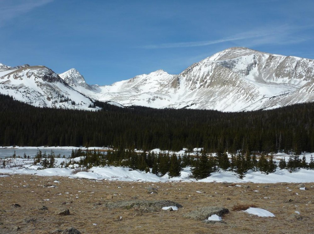 Winter image with snowcovered peaks at Brainard Lake.