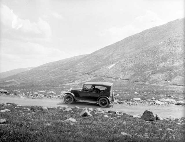 Model T on dirt road above treeline
